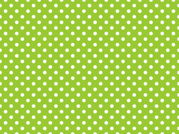 texturised white colour polka dots pattern over yellow green useful as a background