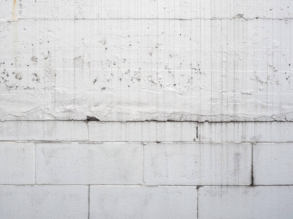 White concrete wall texture useful as a background