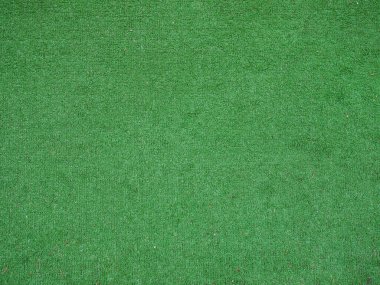 Sanayi tarzı yeşil sentetik çimen dokusu arka plan olarak kullanışlı
