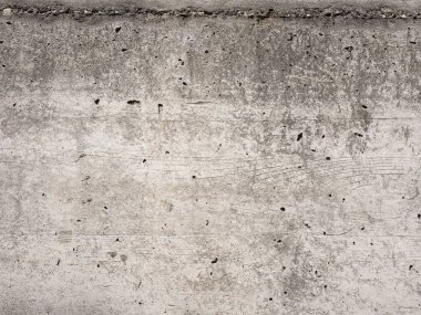 industrial style grey concrete wall useful as a background