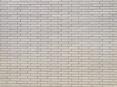 industrial style white brick wall useful as a background