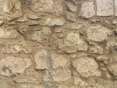 Kahverengi taş duvar arka plan olarak yararlı