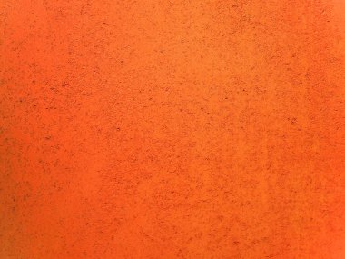 Sanayi tipi turuncu alçı duvar arka plan olarak kullanışlı