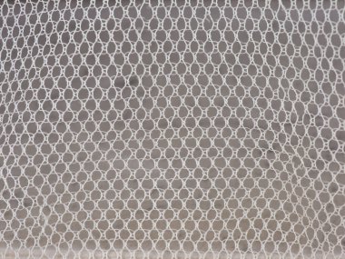 Sanayi tipi bej kumaş ağ dokusu arka plan olarak kullanışlı