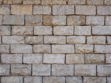 Sanayi tipi gri taş duvar arka plan olarak kullanışlı