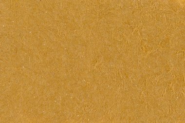 Tahtadan elde edilen selüloz hamur lifleri açıkça görülebilen kahverengi kartonun endüstriyel mikro grafik görüntüsü