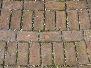 Sanayi tipi yıpranmış kahverengi kırmızı tuğla zemin arka plan olarak kullanışlı