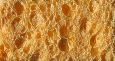 Sanayi tipi sarı sünger dokusu arka plan olarak kullanışlı