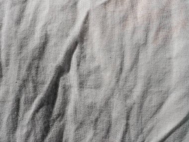 Beyaz pamuk kumaş dokusu arka plan olarak kullanışlıdır