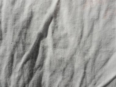 Beyaz pamuk kumaş dokusu arka plan olarak kullanışlıdır