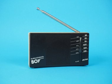 NUREMBERG, GERMANY - DECEMBER 11, 2024: Grundig Boy portable fm and am radio tuner clipart