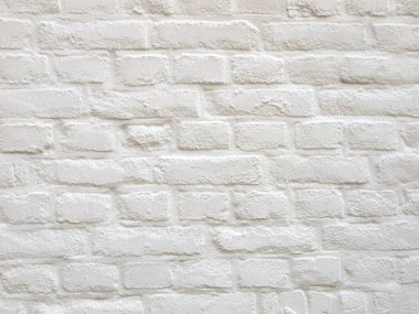 industrial style white brick wall useful as a background