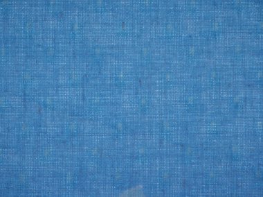 industrial style light blue cotton fabric texture useful as a background