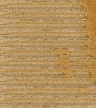 industrial style brown corrugated cardboard texture useful as a background