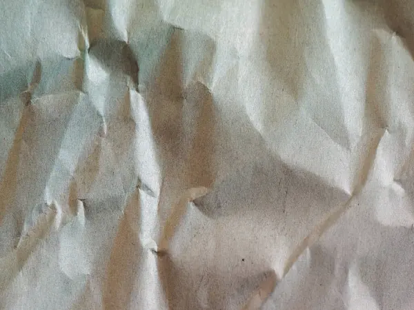 Sanayi tipi yeşil kırışık kağıt dokusu arka plan olarak kullanışlı