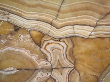 Sanayi tipi sarı ve kahverengi mermer dokusu arka plan olarak kullanışlı