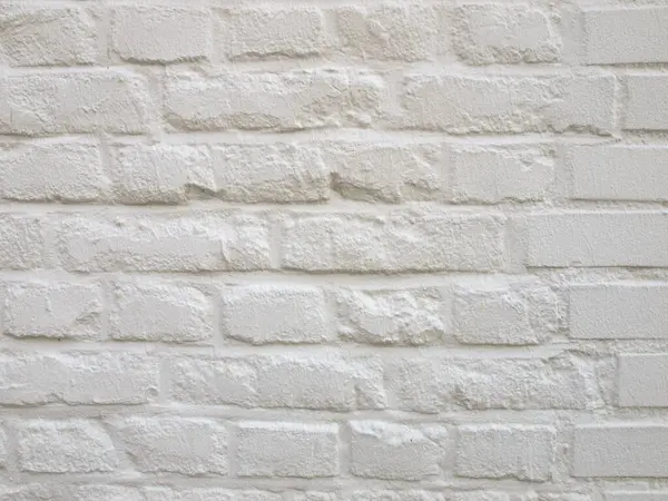 industrial style white brick wall useful as a background