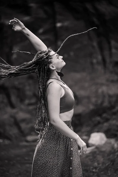 stock image Beautiful girl with dreadlocks, dressed hippie style,poses outdoors.