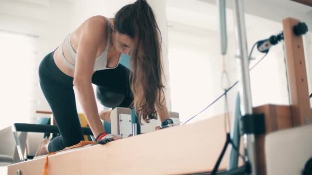 Beautiful Slim Woman Practices Pilates Ball — Stock Video