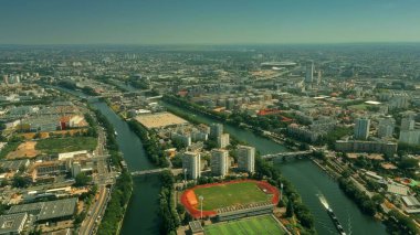Aerial view of Saint-Denis involving Stade de France stadium clipart