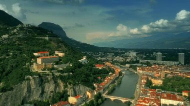 Aerial establishing shot of historic part of Grenoble clipart