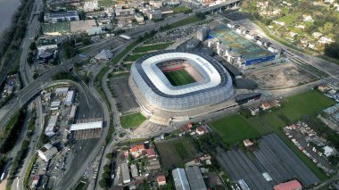 NICE, FRANCE - MARCH 10, 2024 Aerial shot of the Allianz Riviera football arena clipart