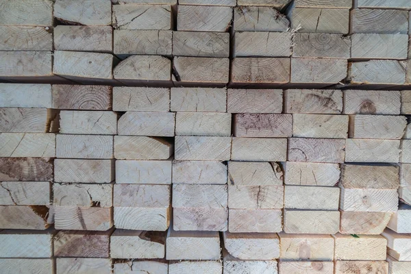 Stack of cut Lumber wood in a lumber Factory in industrial area