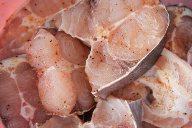 Raw fish steaks ready for grilling