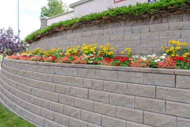 Retaining wall in residential area to protect against erosion