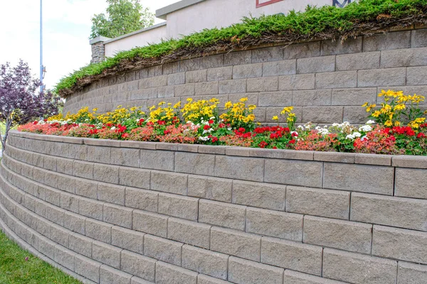 Retaining wall in residential area to protect against erosion