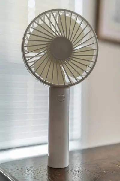 stock image Portable handheld fans for keeping cool