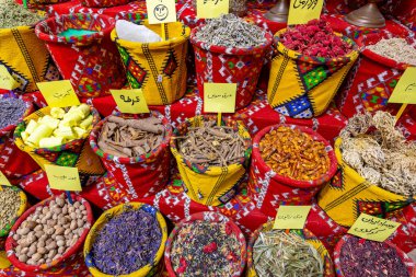 Exotic Spices in the Old Souq of Mutrah, Oman. Traditional Bazaar with Ingredients of Omani Cuisine. clipart