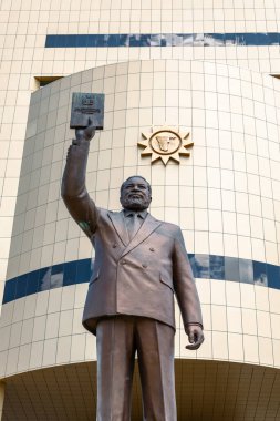 Museum in Windhoek. Sam Nujoma Monument in front of The Independence Memorial Museum  in Windhoek, Namibia. Africa. clipart