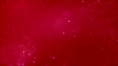 Kırmızı zemin üzerinde beyaz parçacıkların hareketi ile arka plan, parçacıklar ve bokeh