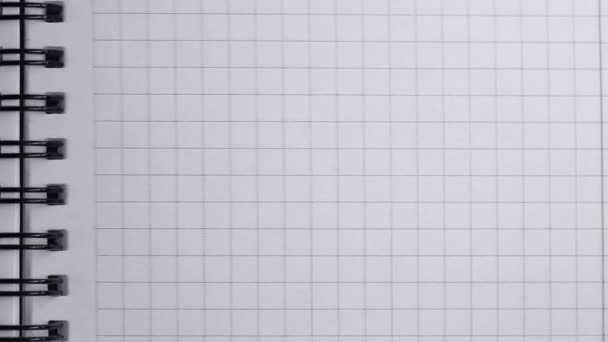 Draaien Checkered Sheets Een Schoolschrift Close School Kantoor — Stockvideo