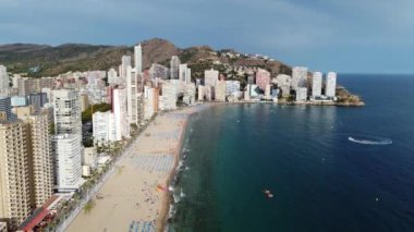 summer vacation and travel concept - beautiful aerial view of beach promenade and scyscrapers in Benidorm, Spain