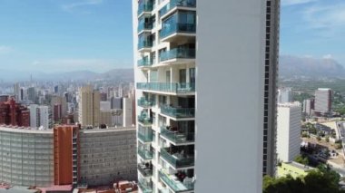 real estate and business concept - aerial view of scyscrapers and hotels in Benidorm, Spain