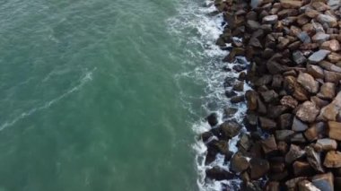 beautiful aerial top view of sea waves and rocky coastline in Torrevieja, Spain