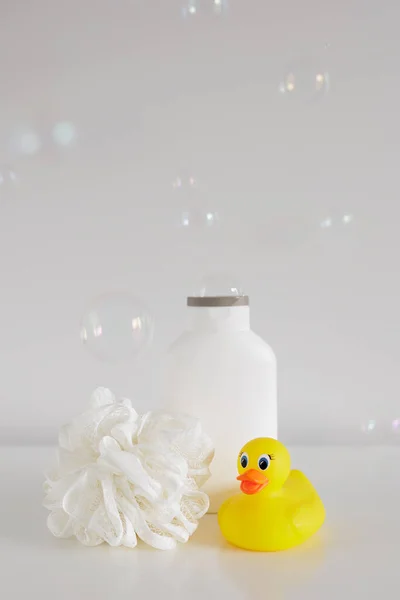 Bath Concept Sponge Douch Gel Yellow Duck Bubbles White Table — Stock Photo, Image