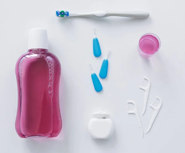 Flatlay Dental Floss Toothbrush Toothpicks Rinse White Background — Stock Photo, Image