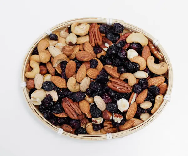 Top View Wooden Bowl Mixed Nuts White Table Background Royalty Free Stock Images