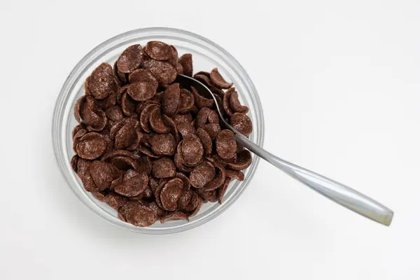 Céréales Choco Servies Dans Bol Verre Avec Cuillère Sur Fond Photo De Stock