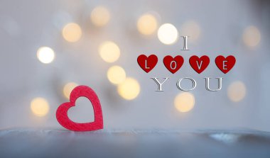 Valentines Day text with hearts on background, happy valentines