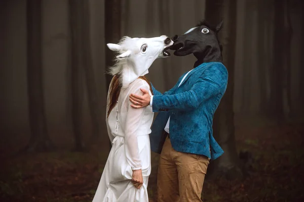 Funny wedding. Horse masks. Horse heads. April Fool\'s joke.