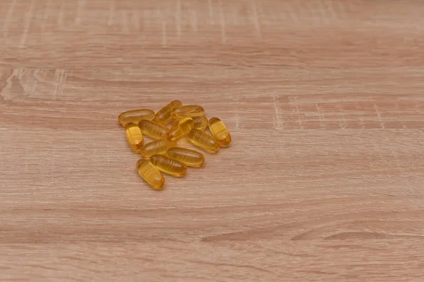 vitamin supplement tablet. pills on the table. close-up
