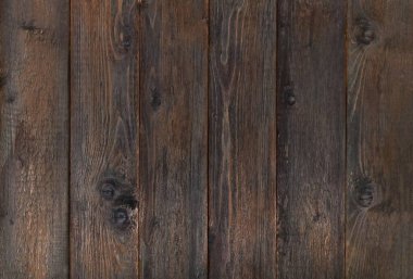 Koyu kahverengi tahtalar, doğal desenli düğümler. dikey paneller