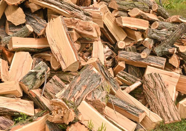 Firewood background. Ecological fuel for home heating.