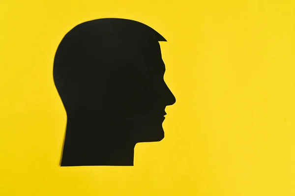 Silhouette of a man\'s head. Side shot. concept