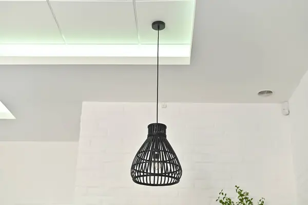 black look pendant lamp in a cafe interior. High quality photo