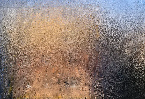 wet window glass. textured background of a drop on glass